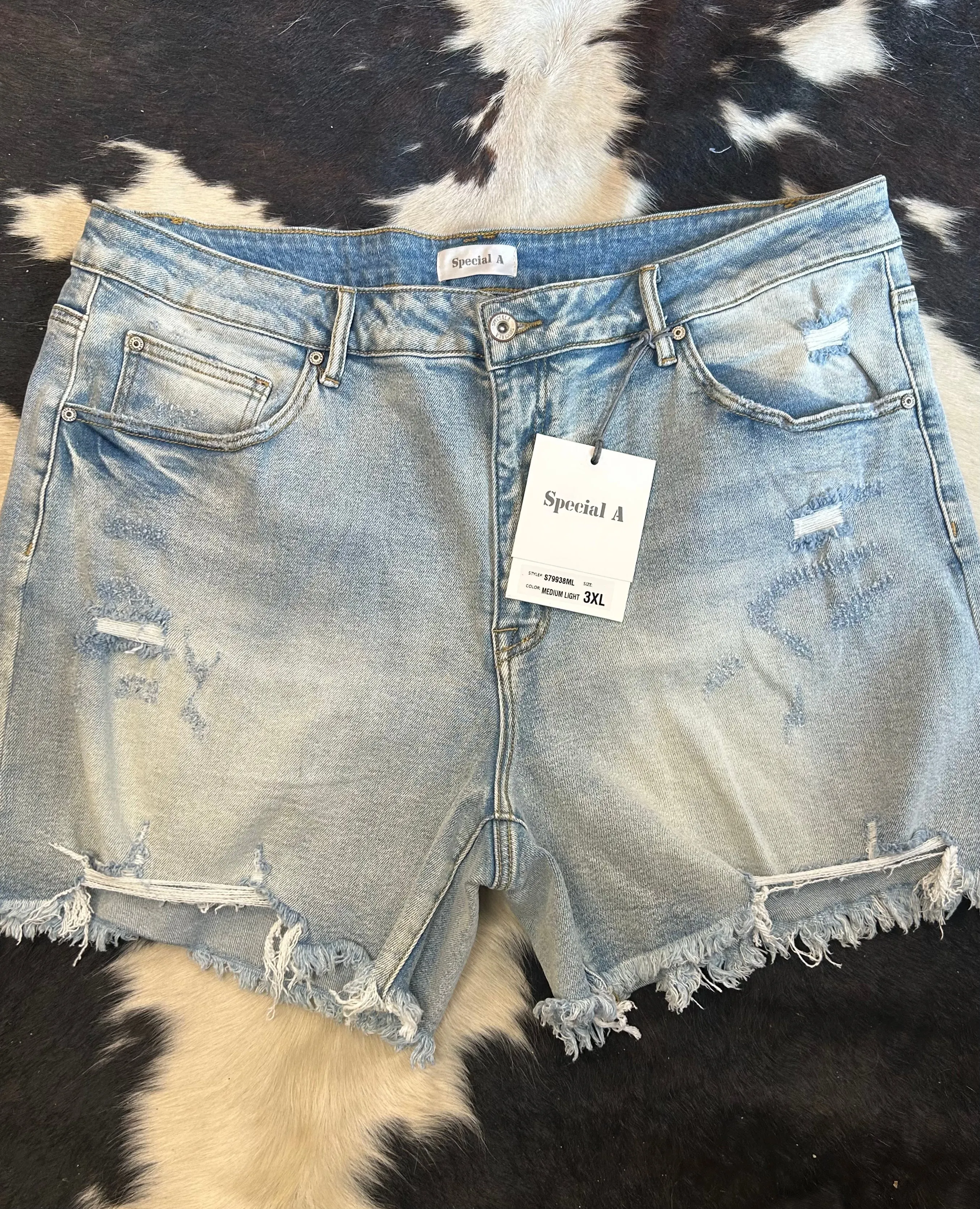 Medium Light Distressed Raw Hem Shorts